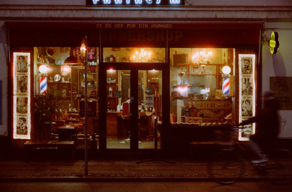 Barber shop entrance with sign and welcoming door
