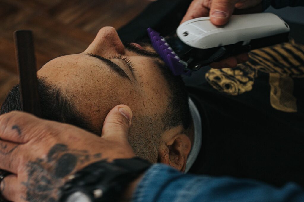 Close-up of beard being trimmed and shaped