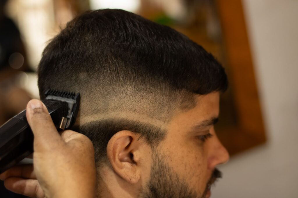 Close-up of a precise fade haircut on the sides